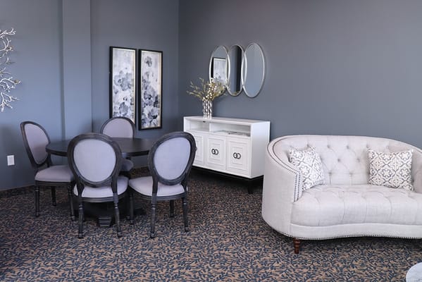 Interior common area with dining table and seating