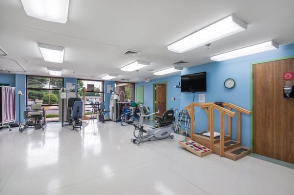 Therapy room with exercise equipment and therapy stairs