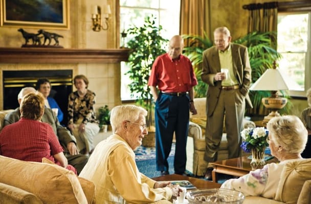 Residents engaging in conversation in a common area