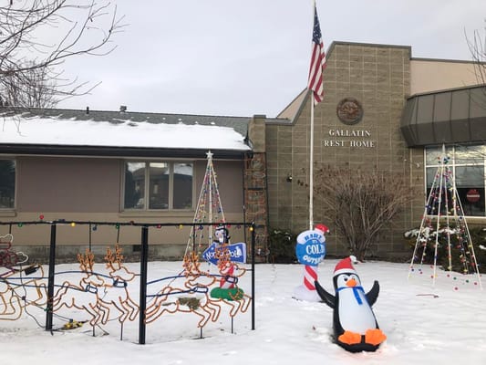 Exterior view of Gallatin Rest Home decorated for winter