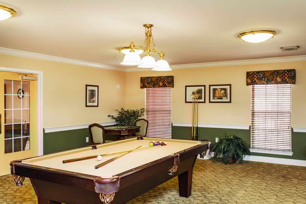 Interior view of a game room with a pool table