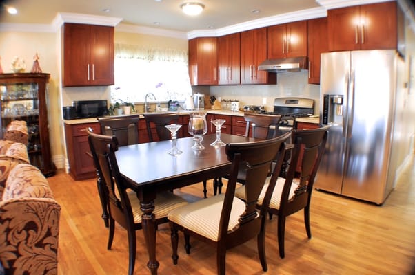 Bright dining area with a wooden table and chairs