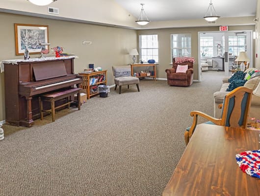 Common area with seating and a piano