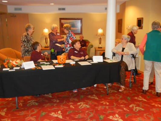 Residents enjoying a social gathering in a common area