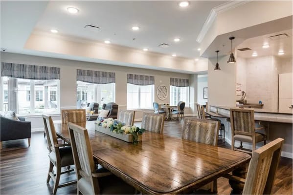 Spacious dining area with a large table and seating