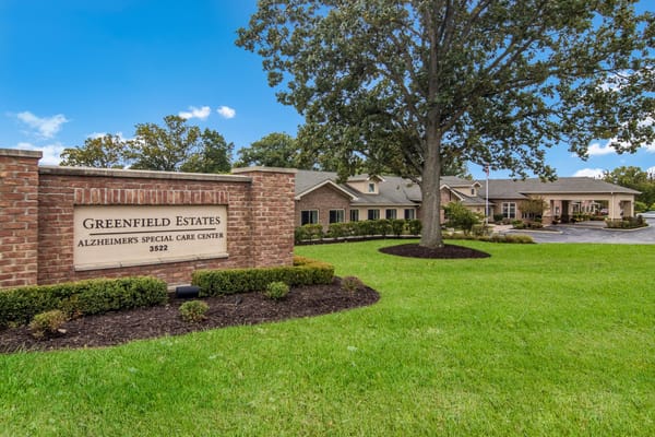 Exterior view of Greenfield Estates facility with signage