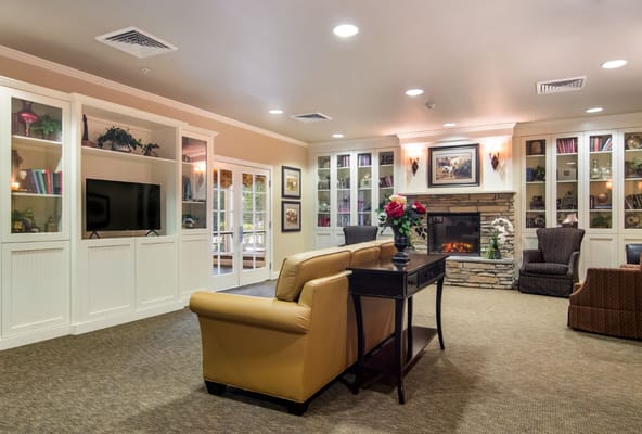 Cozy common area with seating and fireplace