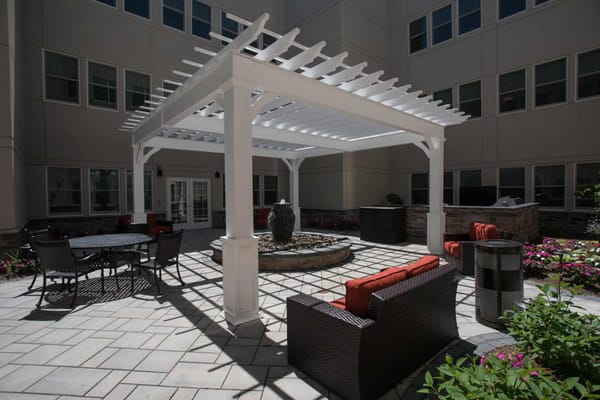 Outdoor courtyard with seating and decorative features