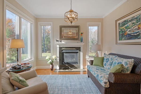 Cozy common area with a fireplace and seating