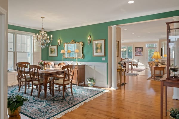 Bright dining area with wooden furniture and decor