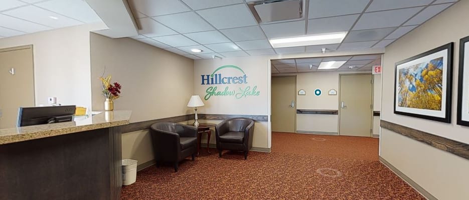 Common area with reception desk and seating
