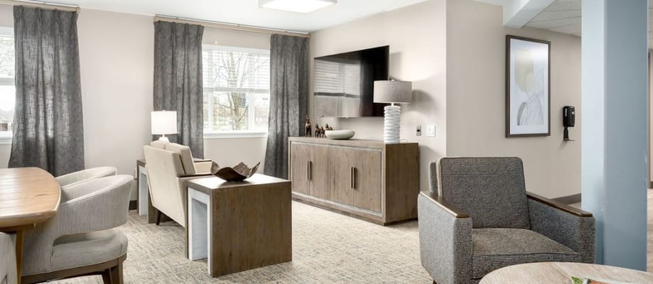 A cozy and modern living room area in the facility