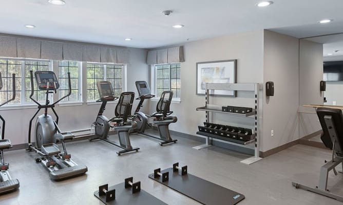 Interior view of a fitness area with exercise equipment