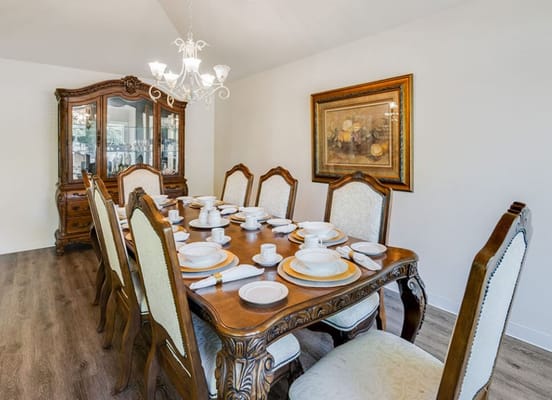 Elegant dining room with a large wooden table