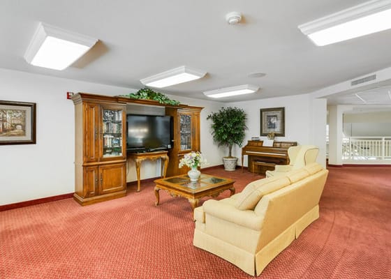 Bright common area with seating and decor
