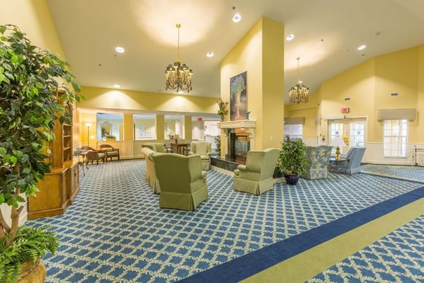 Common area with seating and fireplace