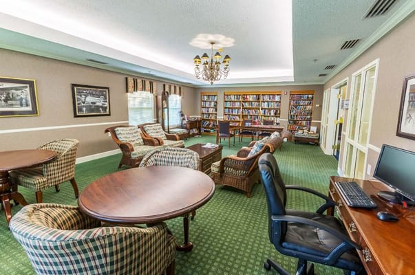 Cozy common area with seating and bookshelves