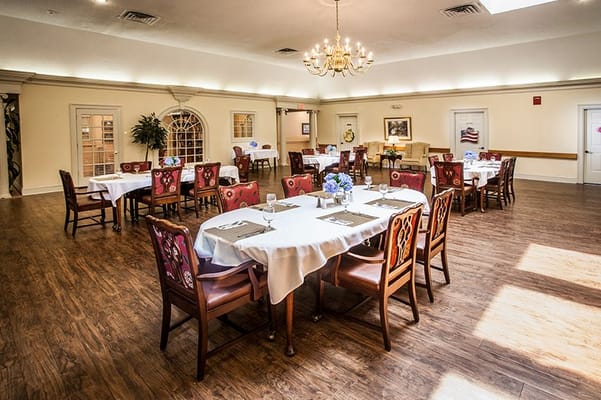 Elegant dining room with tables and chairs set up