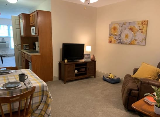 Interior view of a cozy resident room with amenities