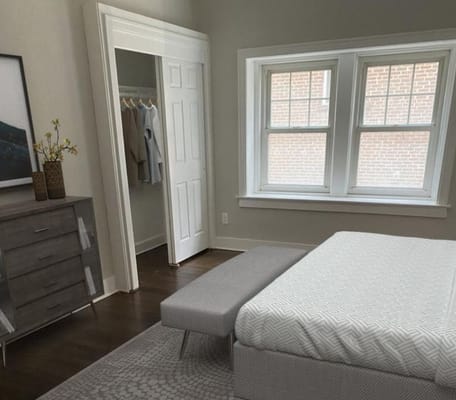 Brightly lit private bedroom in a senior facility