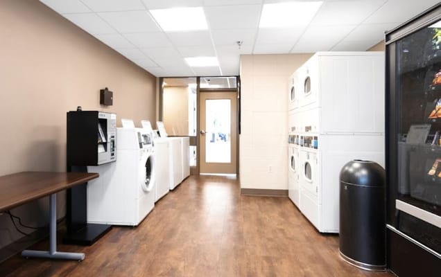 Interior view of a laundry room with machines