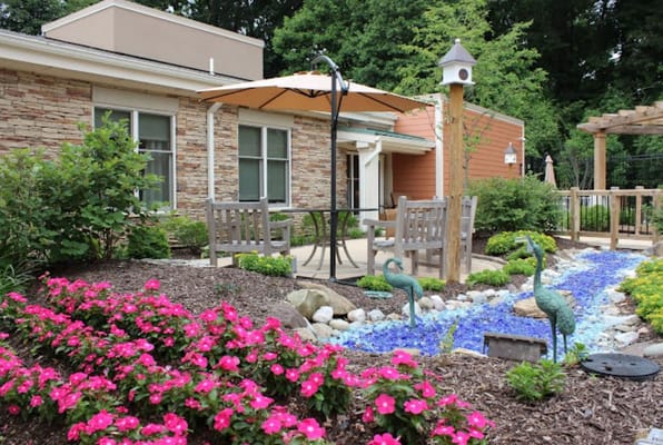 Outdoor seating area with flowers and decorations