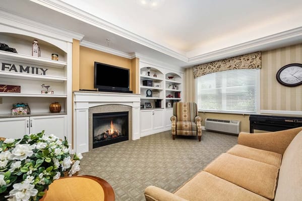 Interior common area with seating and fireplace