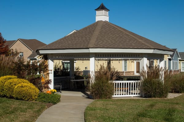 A gazebo in a well-maintained outdoor space