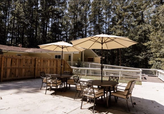 Outdoor seating area with umbrellas and tables