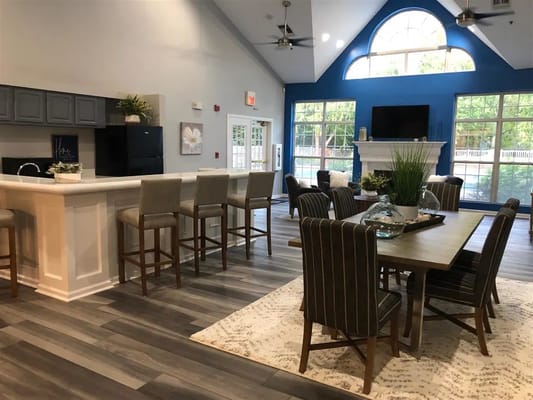 Bright common area with kitchen and dining space