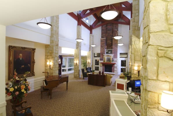 Interior view of a welcoming lobby with stone accents