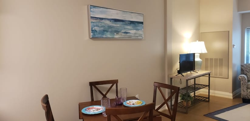 Dining area with plates on the table in the facility