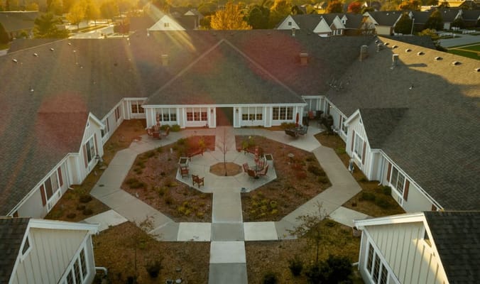 Aerial view of a landscaped courtyard with seating