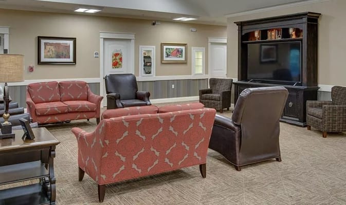 Comfortable lounge area with seating and television