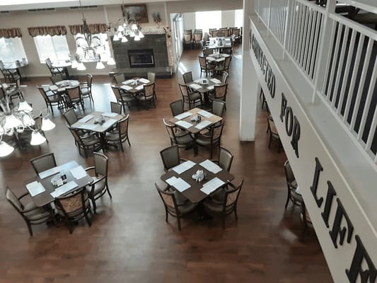 Overview of dining area with tables and chairs