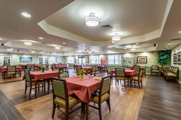 Interior view of the dining room with tables and chairs
