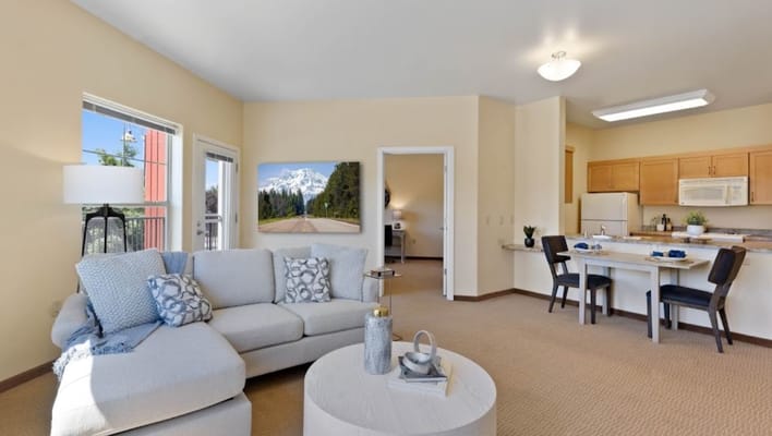 Bright and spacious living room in a retirement residence
