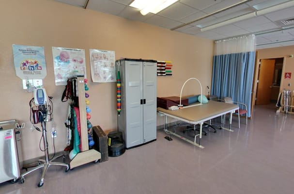 Rehabilitation therapy area with equipment and seating