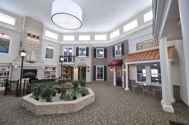 Interior common area with seating and a fountain