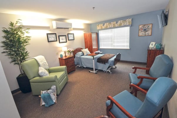 Interior view of a resident room with seating