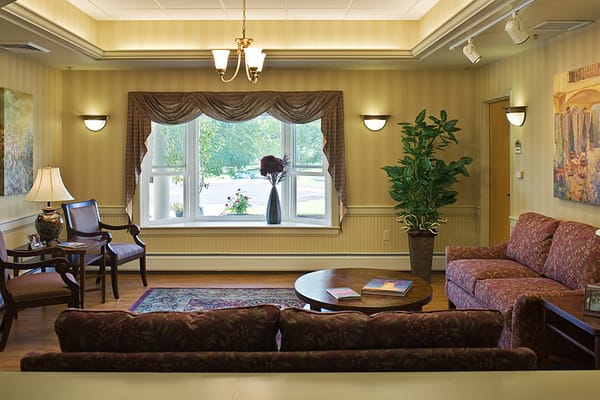 Cozy common area with seating and natural light