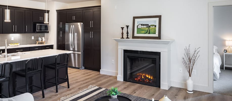 Modern kitchen and living area in retirement residence