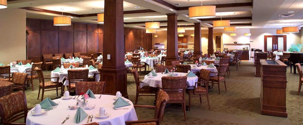 Dining area with tables set for a meal