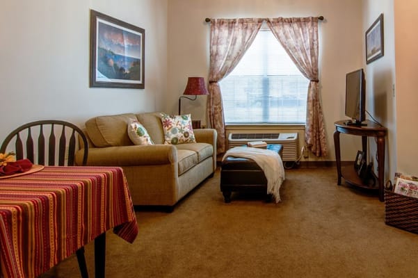 Cozy resident room with a sofa and decor