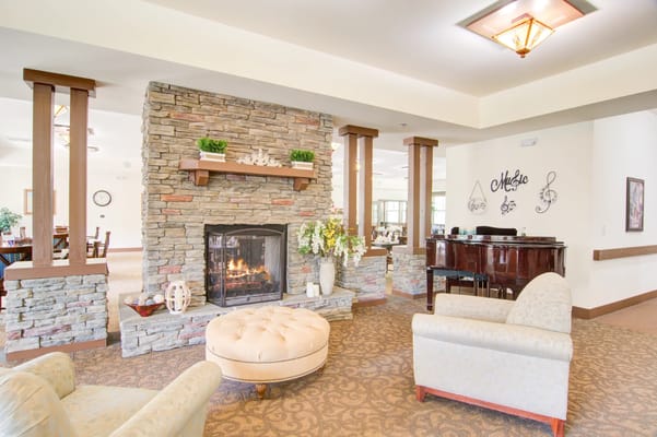 Cozy common area with a fireplace and seating