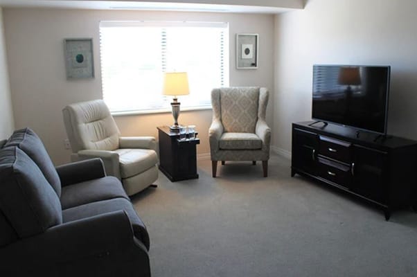 Cozy living area with seating and television