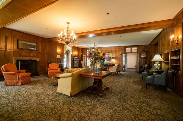 Bright and inviting common area with wooden features