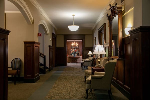 Interior hallway with seating and decorative elements