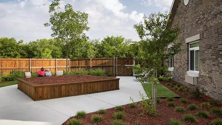 Residents enjoying the outdoor garden area