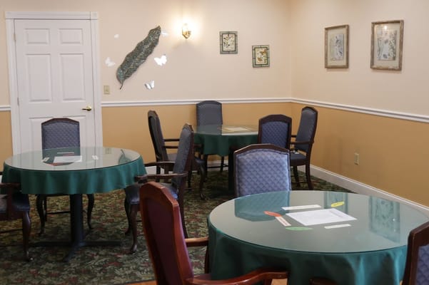 Cozy dining area with tables and chairs set up